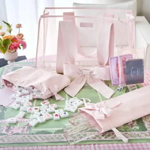 Ballet Pink Mahjong Set on pink and green mat. *Set does not include tiles, mat, racks, or game card. #color_ballet pink bow