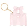 Pink hair ties with a bow and gold keychain on a white background #color_ballet pink bow