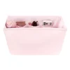Pink fabric organizer with compartments containing various items on a white background #color_ballet pink