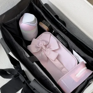 A image of tote organizer with stuff inside #color_midnight black